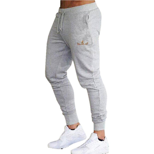 Nouveau hommes pantalons survêtement s pantalons de survêtement survêtement pantalons pantalon décontracté homme marque élastique coton gymnases Fitness Harem hommes pantalons 2019
